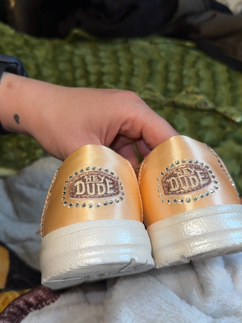 Womens Metallic Rose Gold Slip-On HeyDudes with Rhinestone Detail
Size 7